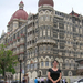 Standing before the Taj Mahal Hotel